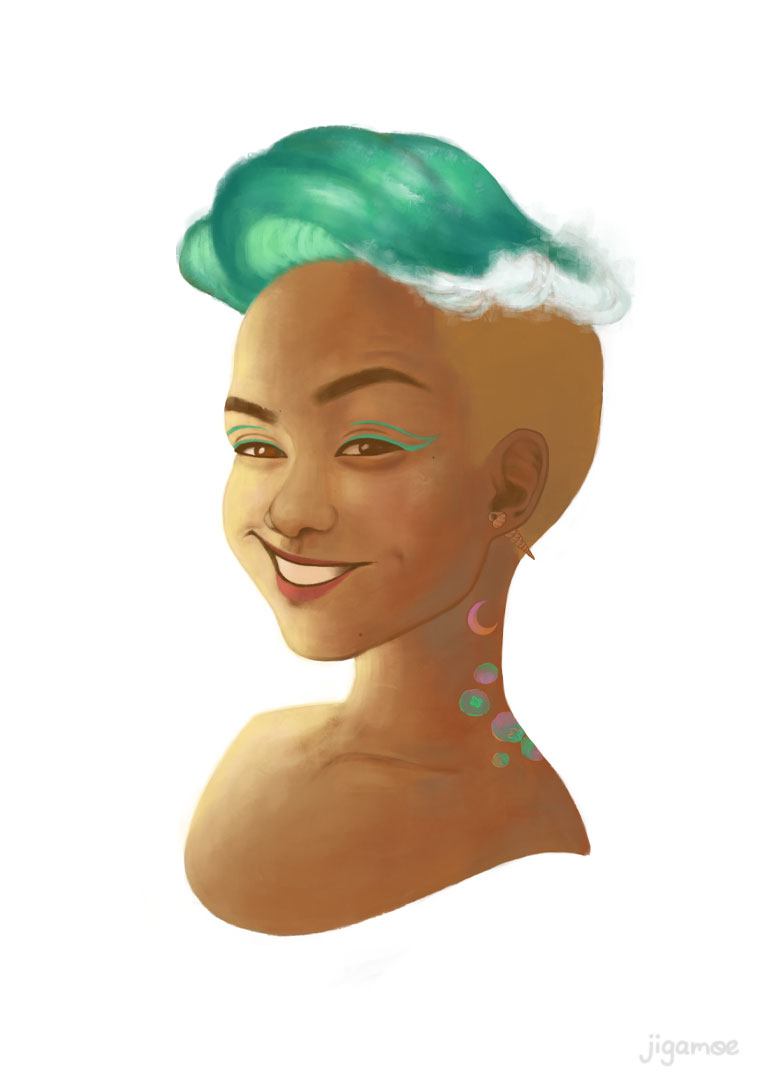 A woman smiles cheekily as light shines from the left, illuminating her short undercut. The hair curves to one side while the shaved area is dyed blonde, like a green wave crashing onto sandy shores. She wears a spire shell earring that pierces through her ear, green eyeliner and has a coloured moon and jellyfish tattoo up her neck.